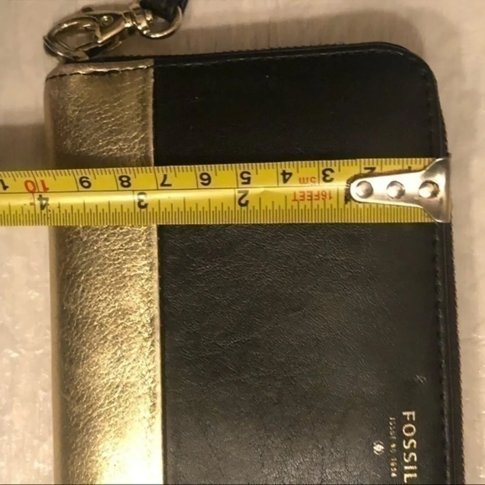 Fossil black and gold leather wristlet clutch wallet